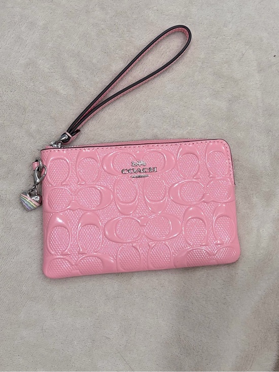 Coach Handbags - Coach powder Pink Patent Signature Wristlet with Charm